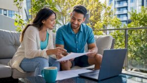 Young couple reviewing mortgage advice at home