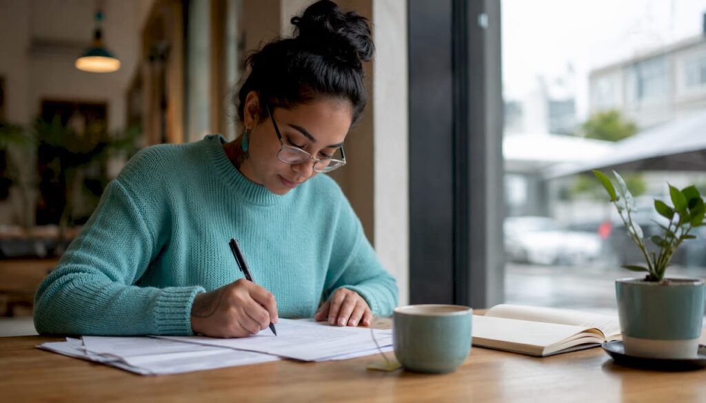 Woman completing house loan application form